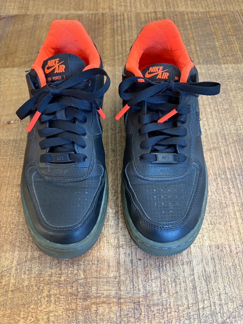 Nike Air Force 1 Shadow SE sneakers in the black and hyper crimson colorway